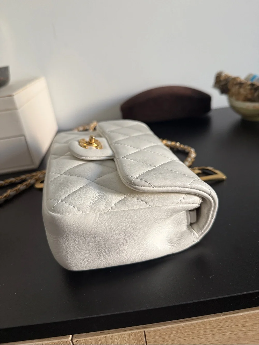 CHANEL White Quilted Mini Flap Bag with Gold Chain and CC Turn-Lock